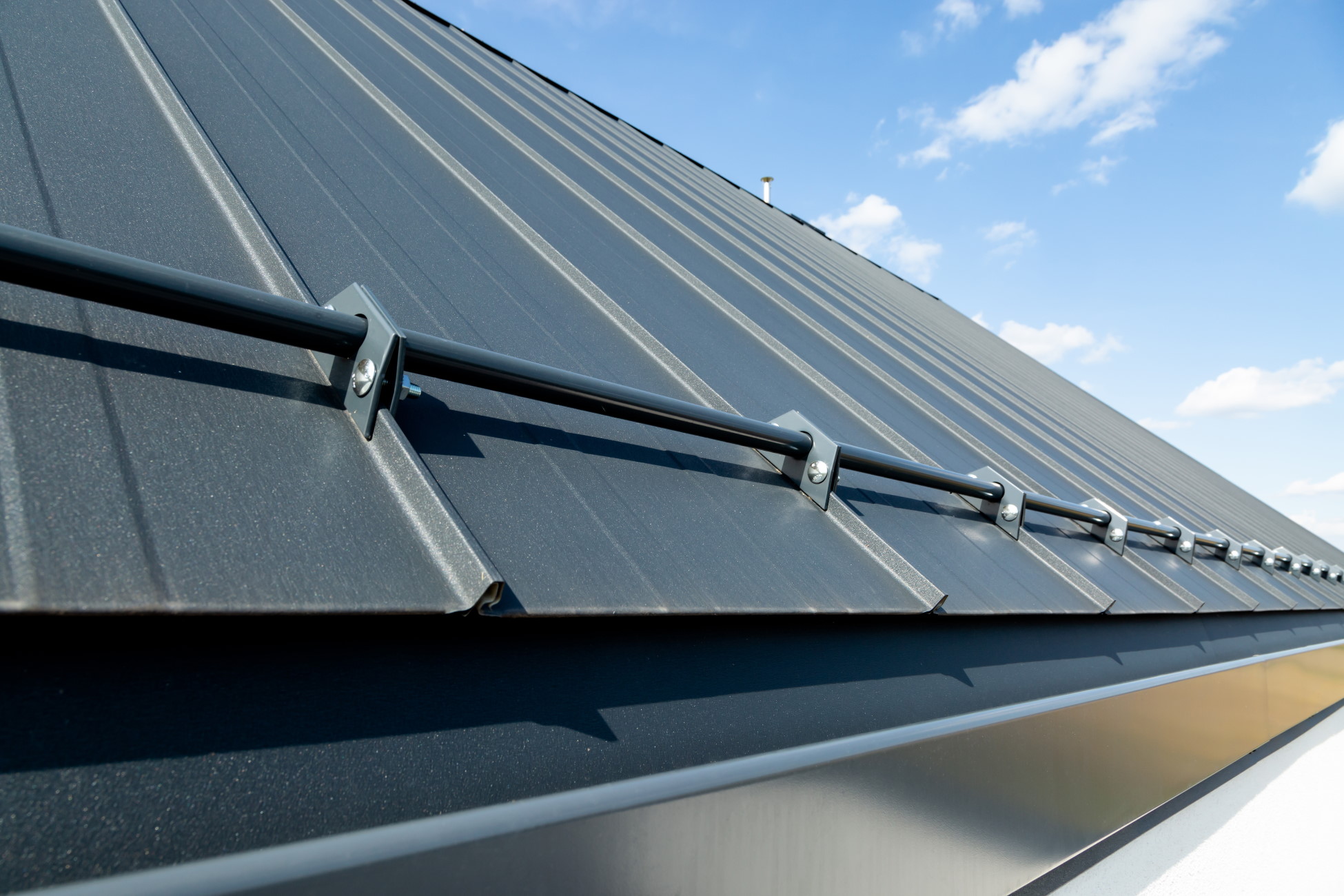 Gipsy Inventor Designs Snow Retention System to Prevent Roof Debris