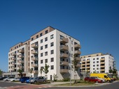 Moderní bytové domy projektu Albatros Kbely v&nbsp;Praze s&nbsp;důrazem na energetickou úspornost. Foto: Jiří Šebek